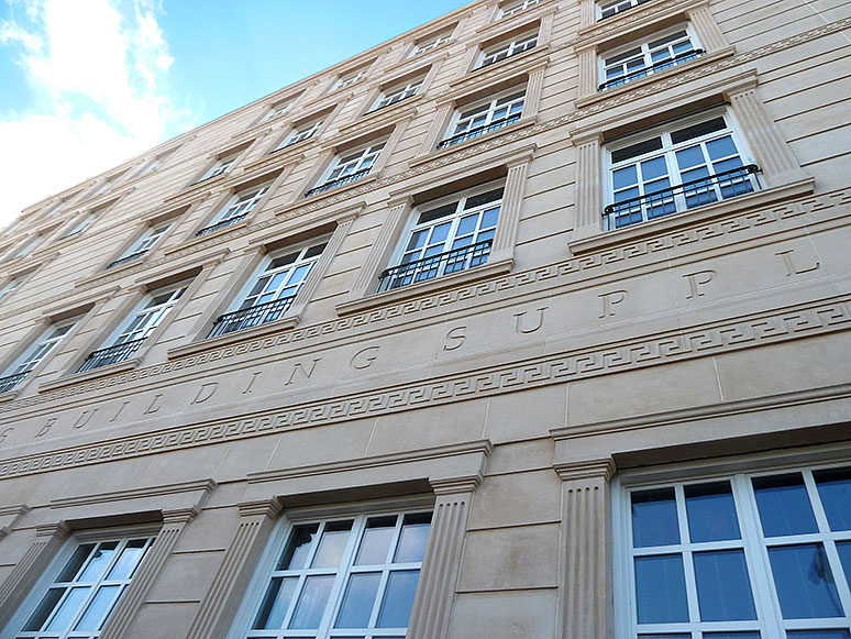 building facade showing masonry stonework