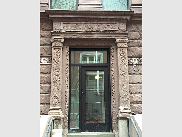 damaged stonework at building entrance