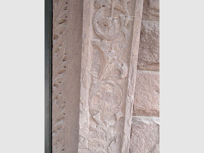 damaged and worn decorative stonework